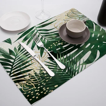 Кафе на зелени листа, на кухненската маса розови аксесоари декор журнального масички златни салфетки за маса Канаваца върху плот на Маса